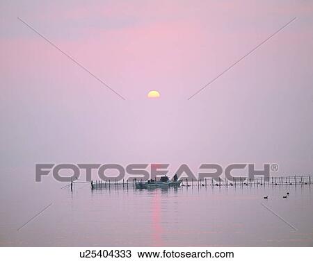 Stock Image - sun light, sun, sky, clouds, outdoors, dawn. Fotosearch