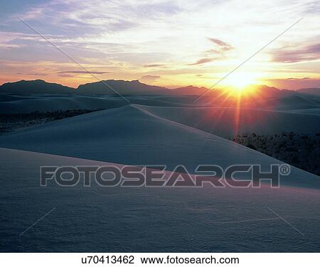 Stock Image - sun light, sun, sky, clouds, outdoors, dawn. Fotosearch