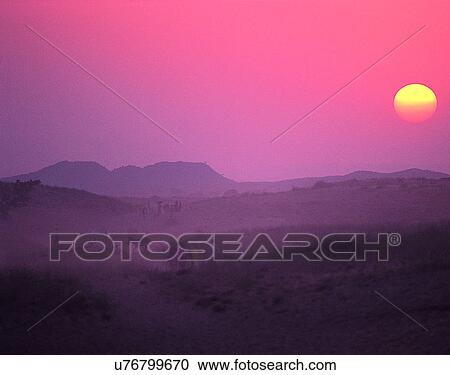Stock Image - sun light, sun, sky, clouds, outdoors, sunset. Fotosearch