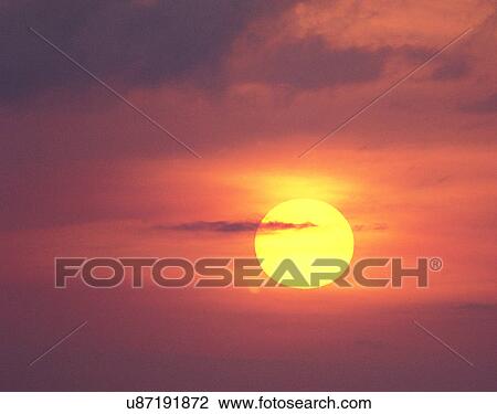 Stock Image - sun light, sun, sky, clouds, outdoors, sunset. Fotosearch