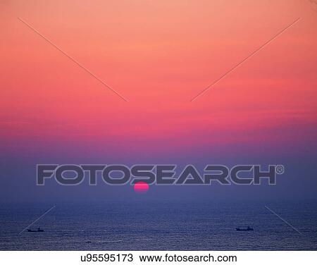 Stock Image - sun light, sun, sky, clouds, outdoors, sunset. Fotosearch