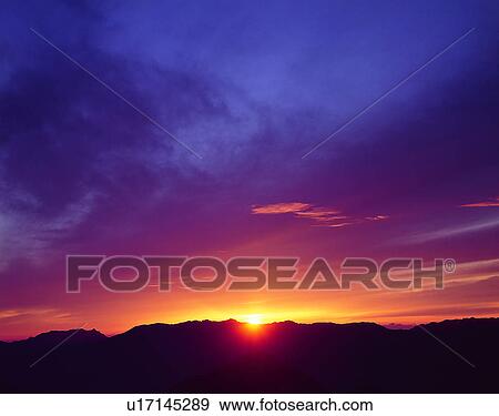 Stock Photo - sun light, sun, sky, clouds, outdoors, sunrise. Fotosearch