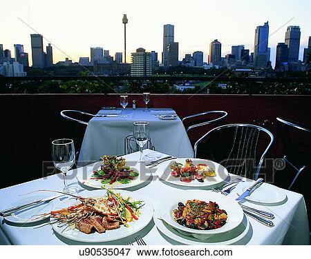 table, outdoors, restaurant, skyline, city, Australia View Large Photo Image Stock Photo - table, outdoors, restaurant, skyline, city, Australia. Fotosearch