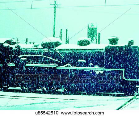Stock Image - train, travel, transportation, outdoors, snow, daylight. Fotosearch