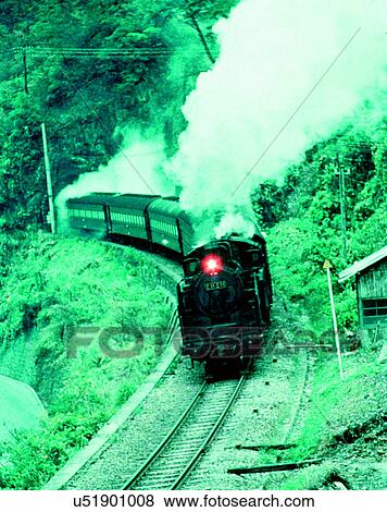 Stock Photo - train, travel, transportation, outdoors, daylight, mountainside. Fotosearch