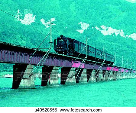 Stock Photography - train, travel, transportation, outdoors, daylight, bridge. Fotosearch