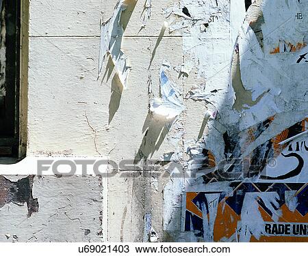 Stock Image - wall, close-up, posters, paint, peeling. Fotosearch