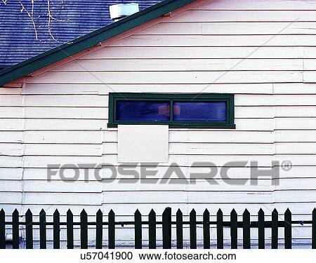 Stock Image - wall, house, panelling, window, fence, white. Fotosearch