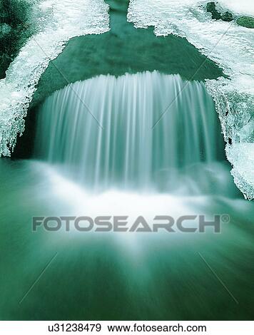 Stock Photo - waterfall, nature, outdoors, rocks, winter, ice. Fotosearch
