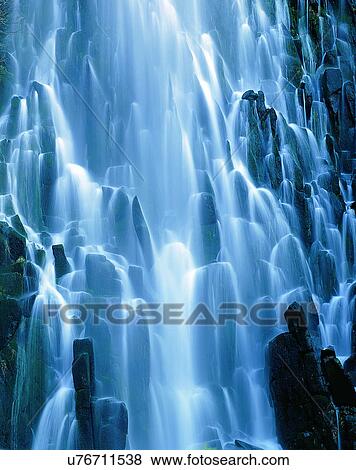 Stock Photo - waterfall, nature, outdoors, rocks, sunlight. Fotosearch