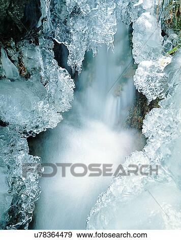 Stock Photo - waterfall, nature, outdoors, rocks, winter, ice. Fotosearch