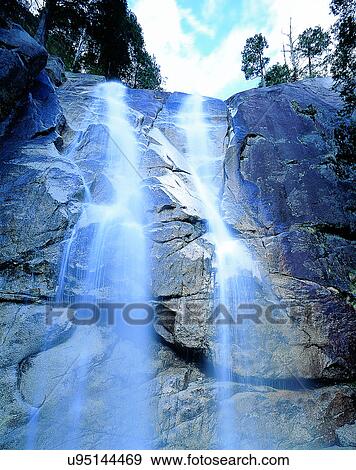Stock Photo - waterfall, nature, outdoors, rocks, mountain, trees. Fotosearch