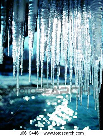 Stock Image - winter, outdoors, close-up, icicles, water. Fotosearch