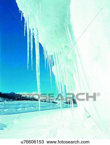 Stock Image - winter, outdoors, close-up, icicles, snow, sky. Fotosearch