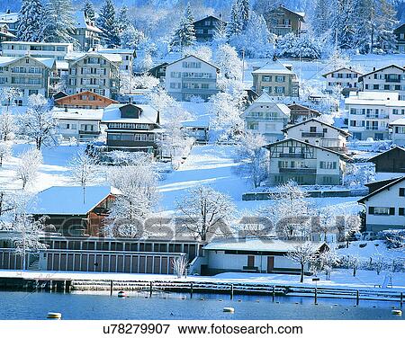 Stock Photo - winter, snow, outdoors, buildings, mountains, landscape. Fotosearch