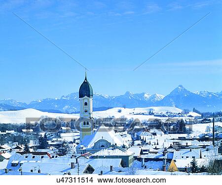 Picture - winter, snow, outdoors, sky, buildings, mountains. Fotosearch