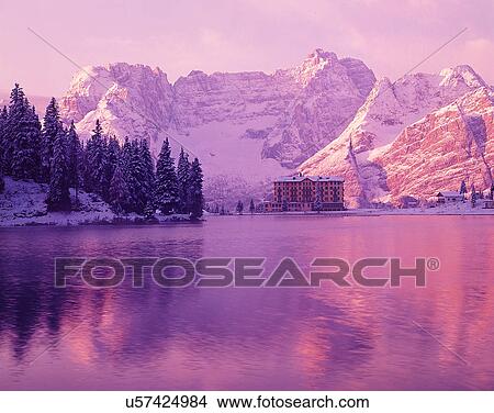Picture - winter, snow, outdoors, sky, buildings, mountains. Fotosearch