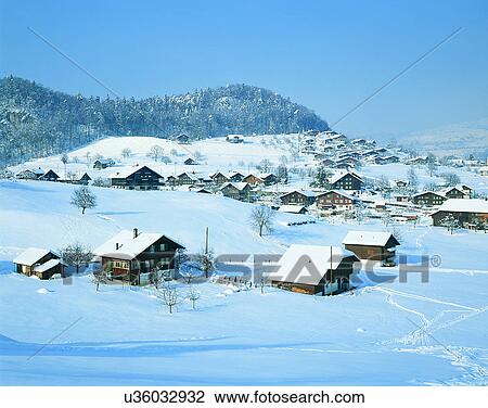 Stock Image - winter, snow, outdoors, sky, buildings, mountains. Fotosearch