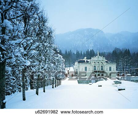 Stock Image - winter, snow, outdoors, sky, buildings, mountains. Fotosearch