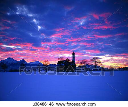 Stock Photograph - winter, snow, outdoors, sky, buildings, mountains. Fotosearch