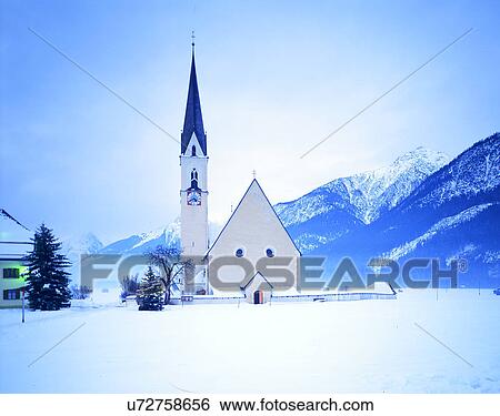 Stock Photograph - winter, snow, outdoors, sky, buildings, mountains. Fotosearch