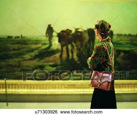 Stock Photograph - woman, inside, museum, painting, looking, purse. Fotosearch
