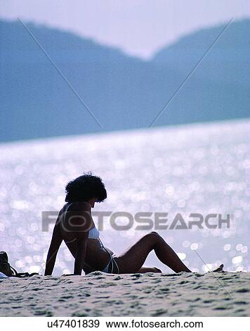 woman, outdoors, beach, sand, water View Large Photo Image Stock Photo - woman, outdoors, beach, sand, water. Fotosearch