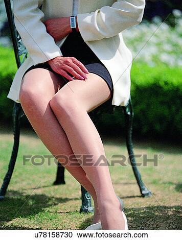 Stock Image - woman, outdoors, close-up, body parts, lower body, legs. Fotosearch