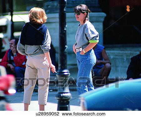 women, outdoors, city, street, talking, standing View Large Photo Image Stock Image - women, outdoors, city, street, talking, standing. Fotosearch