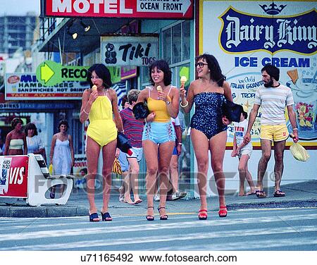 women, outdoors, street, swimsuits, ice cream, eating View Large Photo Image Stock Image - women, outdoors, street, swimsuits, ice cream, eating. Fotosearch
