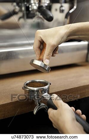 Barista preparing coffee View Large Photo Image Stock Image - Barista preparing coffee. Fotosearch