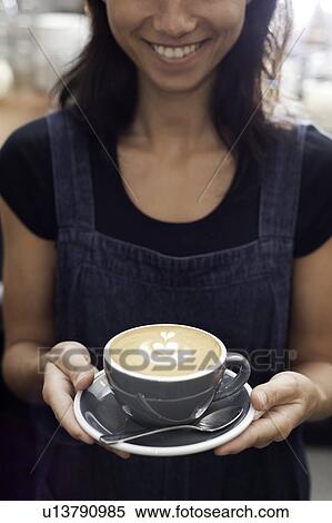 Barista serving cappuccino View Large Photo Image Stock Photography - Barista serving cappuccino. Fotosearch
