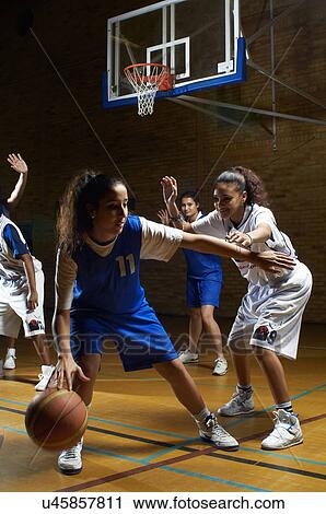 Basketball player defending opponent View Large Photo Image Stock Image - Basketball player defending opponent. Fotosearch