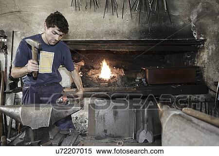 Blacksmith at work View Large Photo Image Stock Photography - Blacksmith at work. Fotosearch