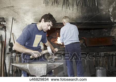 Picture - Blacksmiths at work. Fotosearch