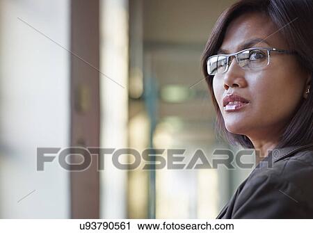 Businesswoman wearing glasses View Large Photo Image Stock Image - Businesswoman wearing glasses. Fotosearch