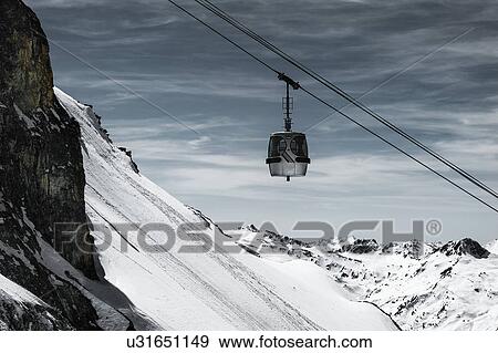 Cable car over mountain, Les Arcs, France View Large Photo Image Stock Photo - Cable car over mountain, Les Arcs, France. Fotosearch