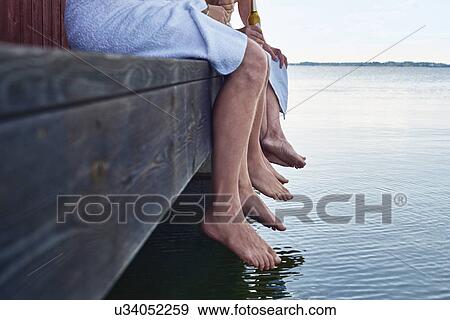 Close up of three males waist down outside sauna View Large Photo Image Stock Photo - Close up of three males waist down outside sauna. Fotosearch