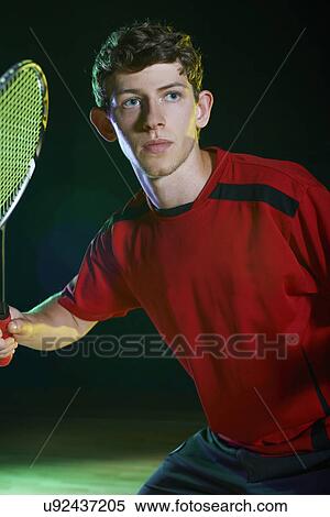 Stock Photography - Close up of young male badminton player. Fotosearch