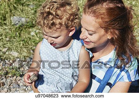 Close up portrait of mother and daughter, Utvalnas, Gavle, Sweden View Large Photo Image Stock Image - Close up portrait of mother and daughter, Utvalnas, Gavle, Sweden. Fotosearch