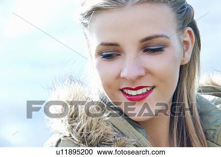 Close up portrait of young woman in parka View Large Photo Image Stock Image - Close up portrait of young woman in parka. Fotosearch