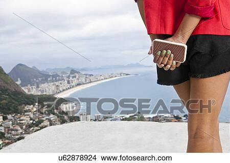 Picture - Close up rear view of young woman, Casa Alto Vidigal, Rio De Janeiro, Brazil. Fotosearch