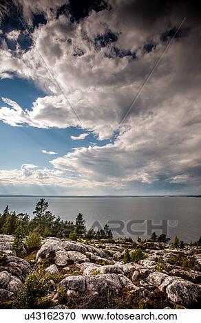 Clouds, water and rocks, Lapland, Sweden View Large Photo Image Stock Image - Clouds, water and rocks, Lapland, Sweden. Fotosearch