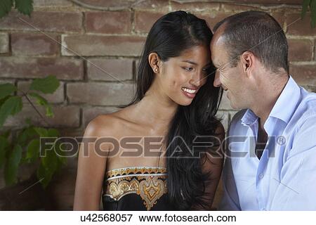 Couple embracing View Large Photo Image Stock Photo - Couple embracing. Fotosearch