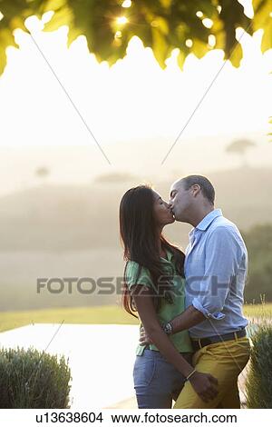 Picture - Couple kissing. Fotosearch