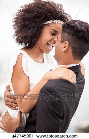 Couple laughing, Alto Vidigal, Rio de Janeiro, Brazil View Large Photo Image Stock Image - Couple laughing, Alto Vidigal, Rio de Janeiro, Brazil. Fotosearch