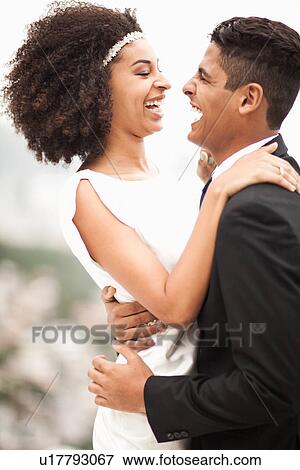 Couple laughing, Alto Vidigal, Rio de Janeiro, Brazil View Large Photo Image Stock Photo - Couple laughing, Alto Vidigal, Rio de Janeiro, Brazil. Fotosearch