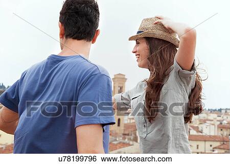 Stock Photograph - Couple looking at view, Florence, Tuscany, Italy. Fotosearch