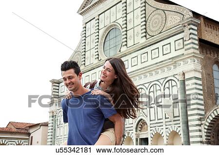 Couple outside Santa Maria Novella church, Florence, Tuscany, Italy View Large Photo Image Stock Image - Couple outside Santa Maria Novella church, Florence, Tuscany, Italy. Fotosearch