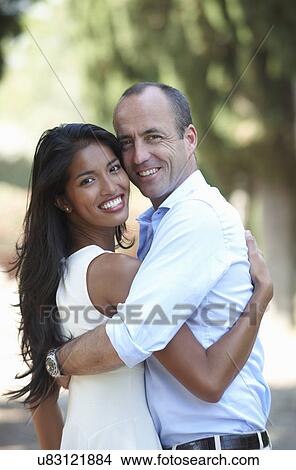 Couple posing for camera View Large Photo Image Picture - Couple posing for camera. Fotosearch